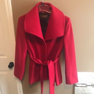 Marvin Richards large red belted coat.
